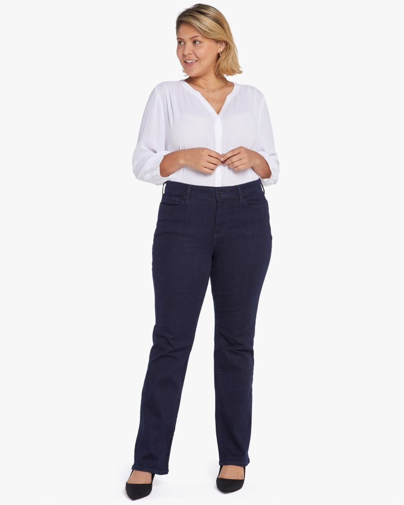 Front of a model wearing a size 14W Marilyn Straight Leg Jean in Rinse by NYDJ. | dia_product_style_image_id:187617